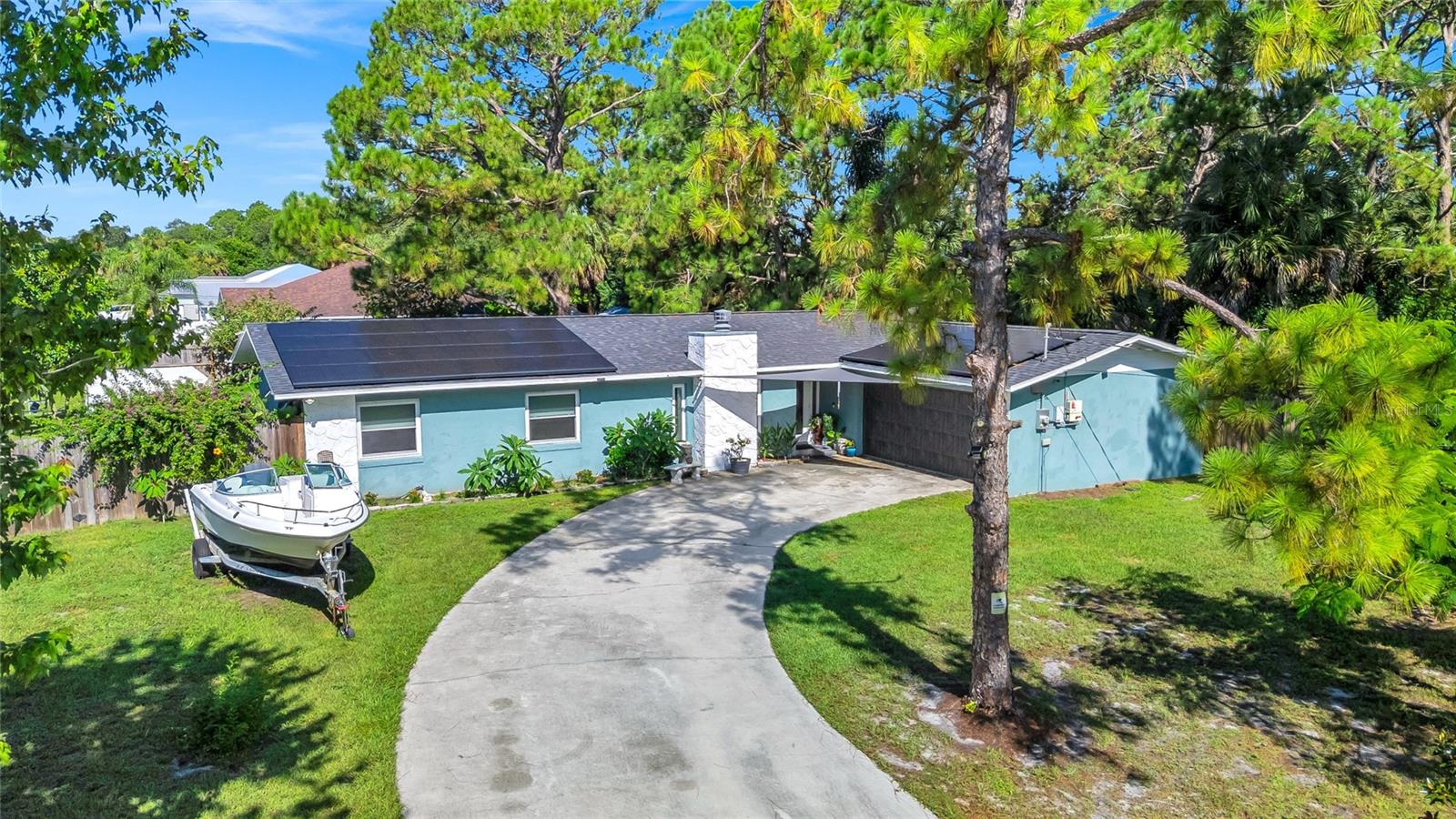 Welcome to 6930 Grissom Parkway - a BEAUTIFUL property in Cocoa, located on a HUGE CORNER LOT on almost HALF AN ACRE!! This home features 4 bedrooms, 2 bathrooms, an open & split floor plan, and an AMAZING backyard!
As you step inside, you'll find a cozy area perfect for relaxing around the wood burning fireplace. Just around the corner, you will notice an open concept layout where the kitchen seamlessly flows into the dining space and living room. The kitchen boasts beautiful granite countertops, an island with space for sitting, and ample natural light! The living room is spacious, great for family time or hosting guests. On the other side of the kitchen is the primary bedroom and laundry room. The primary bedroom is very roomy with vinyl flooring, a walk-in closet, and a lovely bathroom. On the opposite side of the home, there are three additional bedrooms and a guest bathroom. The bedrooms boasts wood tile flooring and a comfortable atmosphere.
One of the standout features of this home is its large lot size and expansive backyard. Step through the French doors to a covered lanai that overlooks a fully fenced yard with beautiful fruit trees, including guava, Spanish lime, almond, avocado, mango, and cassava! This outdoor space is breathtaking!
This home and property is one of a kind! Just minutes from some of Florida's most popular beaches, restaurants, shopping, and SO MUCH MORE! In just under 45 minutes, you can be at the Orlando International Airport or to any of Orlando's famous theme parks! Call today to schedule a showing! You don't want to miss the opportunity to make this home YOURS!!
Other highlights to note: PAID OFF Solar Panels, A/C (2022), Roof (2023), Garage Door (2024), Septic and Drain Field (2024), NO HOA, Average Electric Bill in the Summer is ONLY $55!!