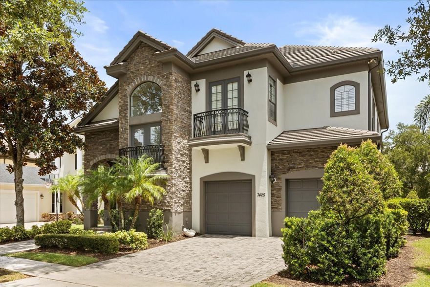 ** EASY TO SHOW** Luxury, Lifestyle and Legacy is on full display at this beautiful home located in the Homestead Community at Reunion Resort.   Welcome to 7425 Gathering Court. This four bedroom, four and ½ bath home is located on a quiet tree lined street that gives you the best of Florida living.  A golf course view home that gives you a great seat for hole number 4 on the Watson Golf Course.  The noticeably well-maintained landscaped yard surrounds the home and has this property standing out with an extremely high level of curb appeal that is accented by the custom stone work.  IT IS NOT IN A RENTAL PROGRAM.  Once you enter the home you are greeted by a formal sitting room and dining room that has been accented by upgraded modern lighting choices.  You can’t help but notice the height of the ceilings, and the wonderful craftsmanship that has gone into the staircase railing that outlines the second floor. The first-floor master is a must and is an oasis that is the quiet get away that you have been searching for.  The space includes new flooring, newer paint, and a generous master closet that has been outfitted with organizational shelving.  You won’t have to lift a finger!  The well-appointed kitchen includes a new cooktop with higher end appliance selections that also includes a new refrigerator.  Please also note that the cabinetry chosen for this home is by European Designer Poggan Pohl. The first floor living space is accented by 22ft tall ceilings, elevated windows, recessed lighting, and 2 walls of sliders that let in tons of natural day light.   There is also breakfast bar seating along with a separate sit-down dining space.  The back of this home is just as special as the front.   You will love to look out over the pool and pavers that showcase the entertaining spaces. Especially with no rear neighbor! It is also worth noting that the outside spaces do provide shade and covered portions.  There is an outdoor living room that is outfitted with a large television and fireplace, which is the best place to watch a movie or a game by the pool!  In the upstairs of the home, you will find the additional bedrooms, loft area and theater room, along with BRAND NEW flooring.  Each bathroom has been re-imagined and updated which adds to the charm of the home.  The owners made sure to give this home the care and attention to detail that it deserved.  The property also includes a Theater Room with upgraded seating along with a BRAND NEW PROJECTOR.   Who wants popcorn?  So many upgrades to list that include a Rinnai tankless water heater, a new Aqua link pool heater with remote access, lighting, appliances, etc.  Please see attached list.   Reunion Resort has everything you want in a community including 3 signature golf courses, world class dining, waterparks, lazy river, water slides, firework viewing areas, tree lined streets, dog park, playground, driving range, golf simulator, member events, in-resort shuttle service, and event space. Live the resort lifestyle like a VIP. NO OTHER RESORT IN THE AREA HAS THIS!!! Easy to show and even easier to Enjoy! Reunion Resort Membership available.
