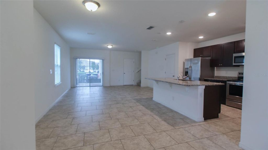 Photo of 9930 Sunny Mews Alley, Winter Garden, FL 34787 (MLS # O6358089)