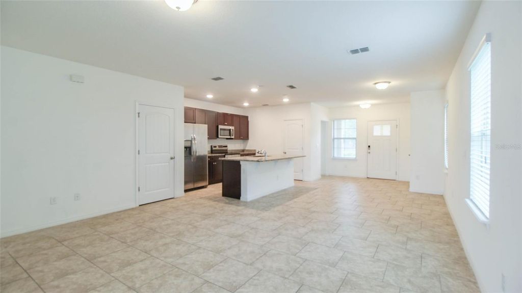 Photo of 9930 Sunny Mews Alley, Winter Garden, FL 34787 (MLS # O6358089)