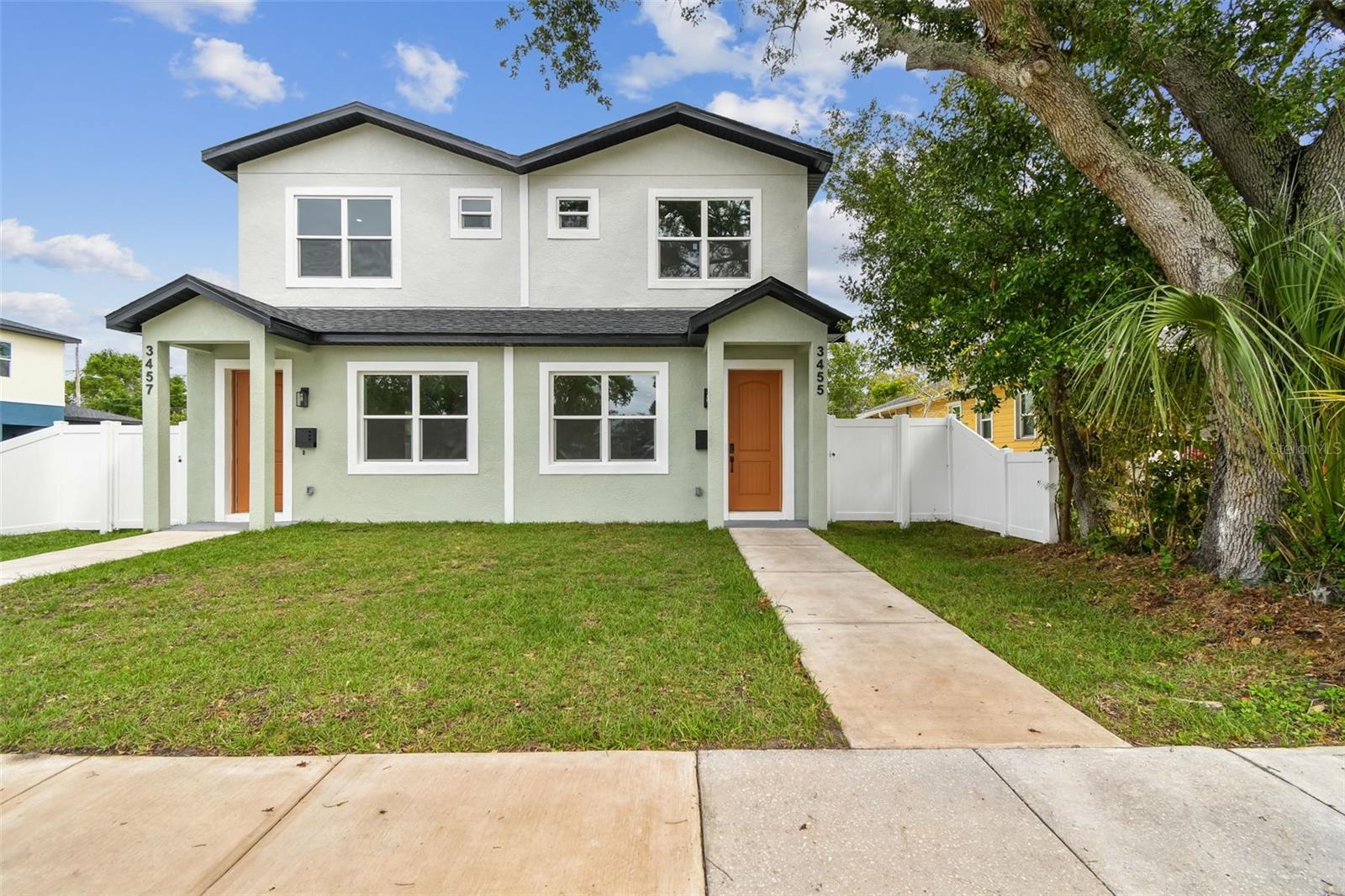 Built with pride and designed for lasting quality. This brand new 3-bedroom, 2.5-bath townhome in St. Pete was built by a quality-driven local builder who takes pride in every detail. From energy-efficient impact windows to premium finishes, this home is filled with craftsmanship you can feel.
Abundant natural light pairs with recessed LED lighting throughout, creating a bright, modern feel in every room. Seamless luxury wood laminate flooring flows across the entire home with no transitions. The open-concept layout connects the living, dining, and kitchen spaces in one effortless flow, making the space as functional as it is inviting.
The kitchen is large and thoughtfully designed, featuring abundant cabinet space and a generous island. It’s the full package, with high-end countertops, a modern backsplash, and stainless steel appliances all included. The downstairs half bath is thoughtfully placed for guests and convenience.
Upstairs, the spacious primary suite includes a large walk-in closet and an en-suite bath with dual sinks, a glass-enclosed shower, and custom tile work. The second upstairs bathroom features a vanity with extra drawer storage and a beautifully tiled shower with a built-in niche and high-end finishes. A laundry closet is also conveniently located upstairs and offers tuck-away storage for easy organization.
The 1-car garage features epoxied floors and rear alley access, making parking and storage easy and efficient. The entire side and backyard are enclosed with a white vinyl privacy fence, complete with front and rear gates for security and peace of mind. Built new from the ground up and backed by a structural warranty, this is far beyond builder-grade.
Call today and make this new build your new home.
