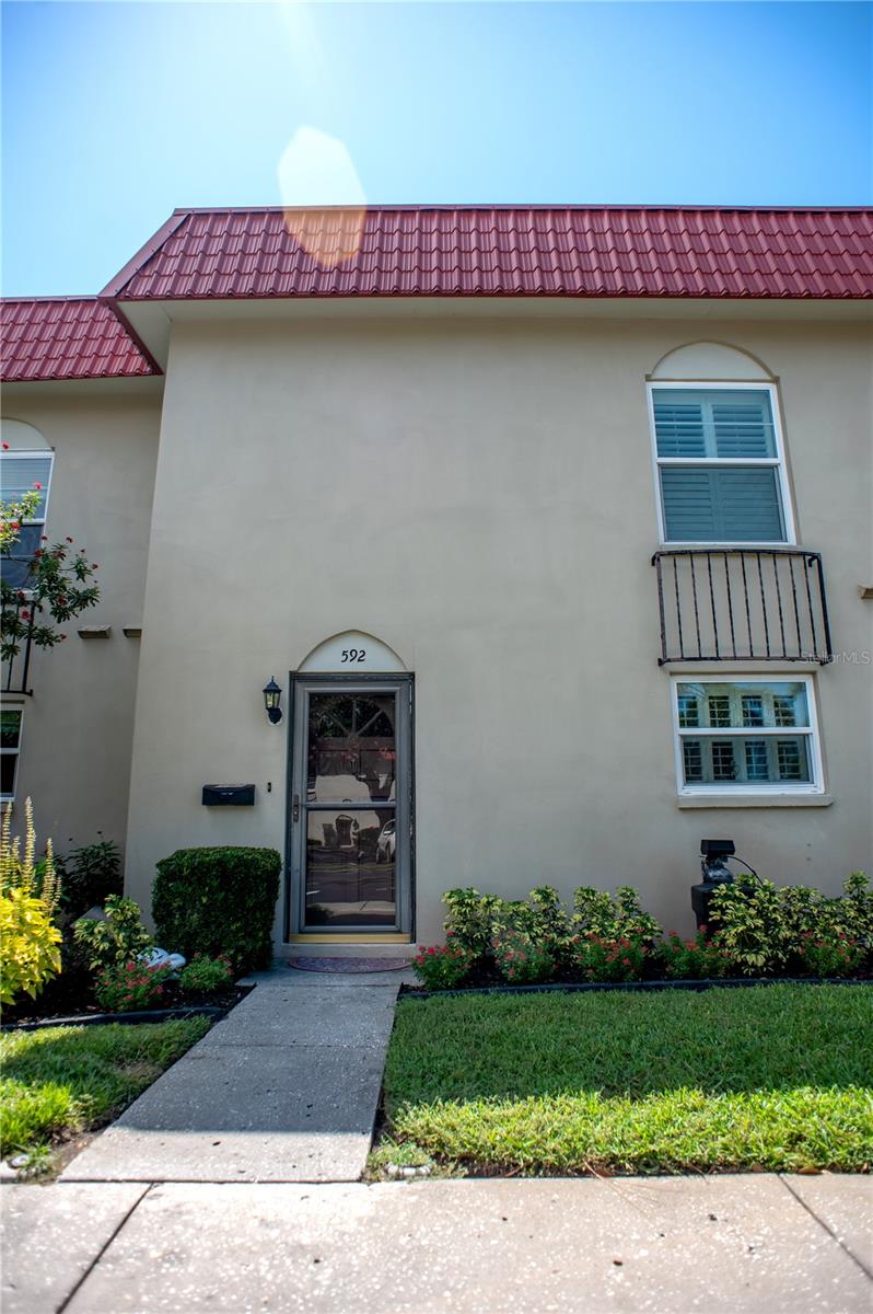 Welcome to Unit 592 at the prestigious Mediterranean Manors community, offering an unparalleled waterfront lifestyle in Dunedin. This thoughtfully updated residence delivers sweeping partial views of the bay and marina from the comfort of your own living space.
Step inside to discover a bright, open-concept floor plan flooded with natural light. The well-appointed kitchen boasts modern appliances and ample cabinetry. Relax in your spacious living area or step out onto the private balcony—perfect for sipping morning coffee while watching boats glide by. The primary suite is tranquil and wonderfully appointed, featuring a walk-in closet and adjacent full bath. Additional bedrooms provide flexibility for guests, a home office, or a hobby studio. Throughout the home, you’ll find a harmonious blend of tile, and laminate flooring, with stylish ceiling fans to enhance comfort.
Residents of Mediterranean Manors enjoy a host of resort-style amenities: direct bay access for boating and water recreation, beautiful landscaped grounds, gated entry, covered parking, and on-site irrigation systems for resort-level maintenance
This sought-after location is just minutes from historic downtown Dunedin, with top-notch dining, shopping, cultural venues, and charming waterfront parks all within easy reach. Local schools—San Jose Elementary, Palm Harbor Middle, and Dunedin High—are rated mid-to-high based on academic performance and community feedback.
With a brand new ac and water heater and roof this property is set for years. If you’re seeking a spacious, light-filled bay-view townhouse with flexible living space and premier amenities in a vibrant coastal community—this is it. Request your showing today!