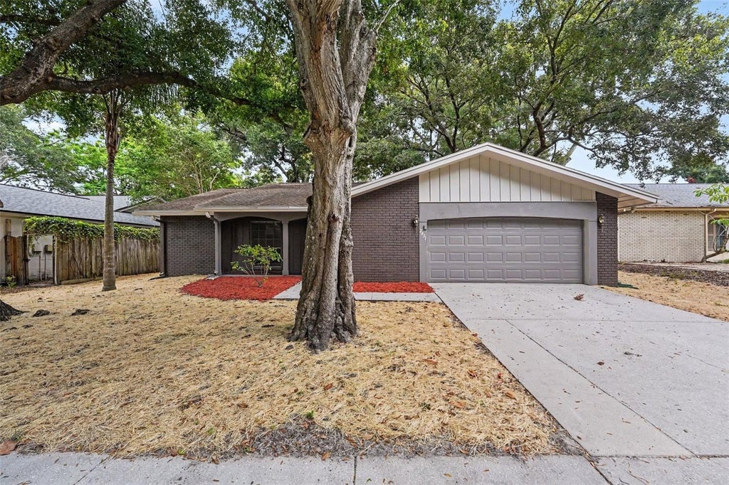 Photo of 2431 Grove Ridge Drive, Palm Harbor, FL 34683 (MLS # TB8525057)