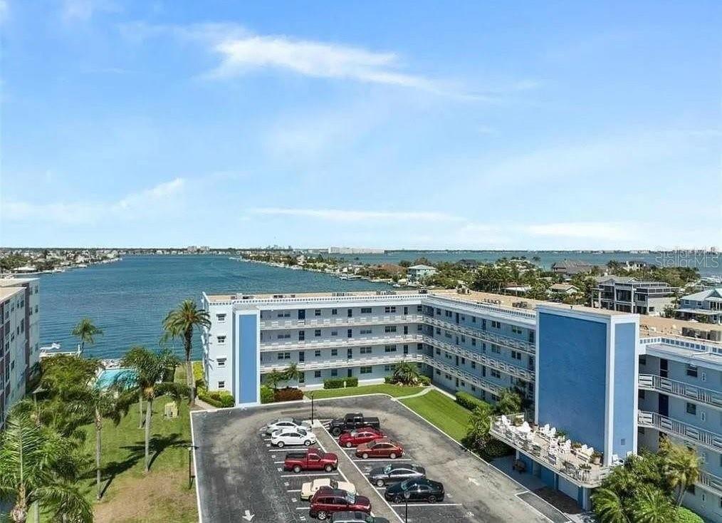 Fantastic opportunity to purchase a unit with a canal view in this fabulous location in St Pete Beach. The unit is vacant and is priced to allow for the new owner to renovate to their own personal vision.
2 saltwater pools, outside Patio, Fishing piers, shuffleboard, fitness room, Clubhouse, Fitness Center, Pool, locked storage area, designated covered parking spot and guest parking available. The exterior of the community is well maintained, and has been recently painted. 2024 New Roof . AC 2023 windows 2024 hurricane grade. laundry room on landing next door. There is also an enclosed bonus sun room overlooking the canal. The building also features an elevator. Leasing Restrictions, no more than one lease a year with 90 day minimum. The beach is across the street.