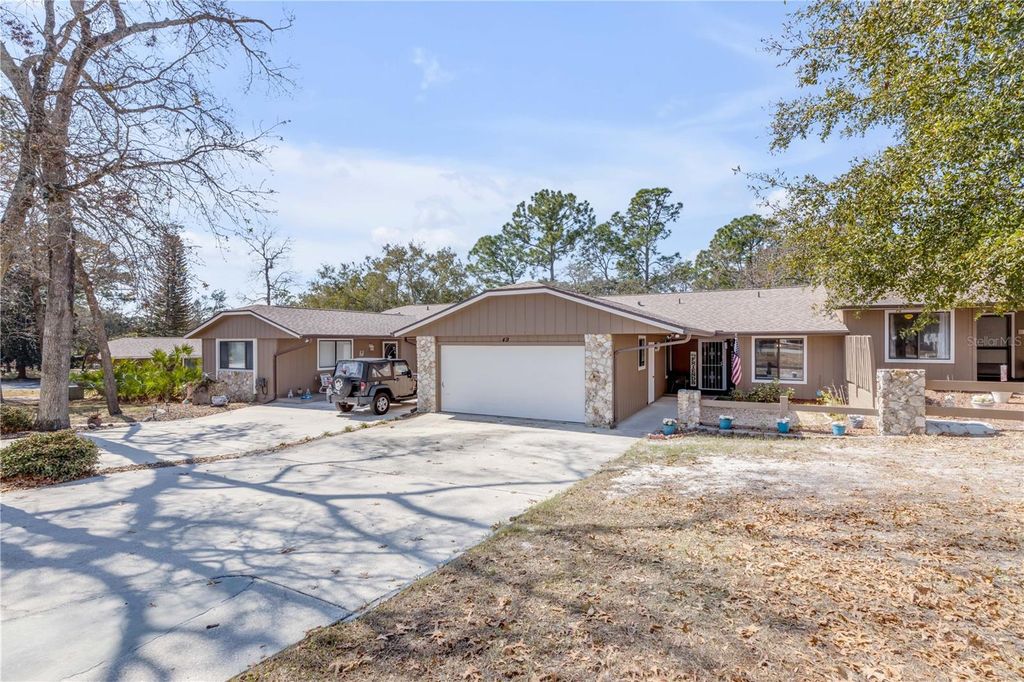 Photo of 49 Crooked Pine Road, Port Orange, FL 32128 (MLS # V4947910)