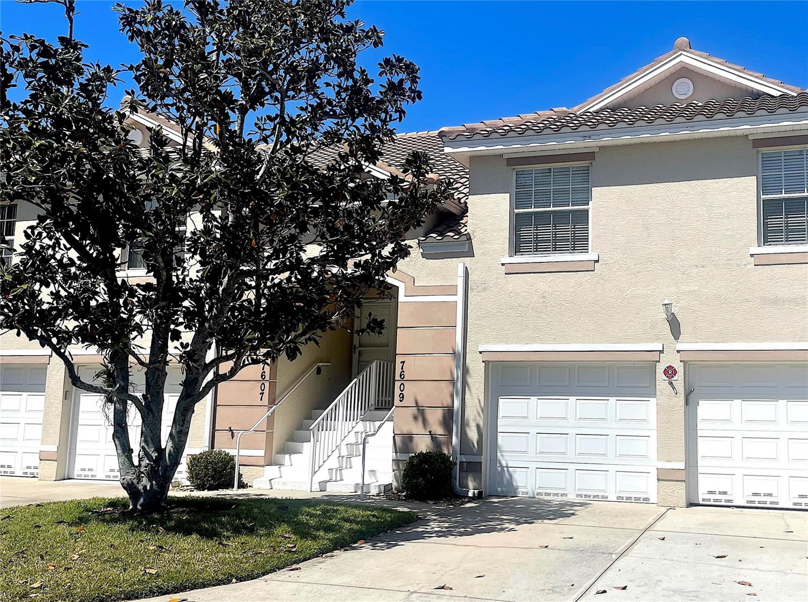 BRAND NEW ROOF! Gorgeous and pristine, this 2 Bedroom 2 Bath condo is tucked away in the idyllic ‘Magnolia Crossing’ neighborhood of ‘Tara Preserve Golf and Country Club’. Perfectly equipped for snowbird or year-round living, you’ll truly appreciate the flow through the modern and open floor plan. The screened in balcony stretches across the entire rear expanse of the home, providing you with a picturesque view of a lovely pond from both the great room, and the primary en-suite bedroom. Vaulted ceilings and well positioned windows create abundant light throughout. An eat-in kitchen, with high quality finishes, stainless steel appliances, handy built in desk/workstation, all add to the lovely overall aesthetic of the home. The AC/Heating System and water heater are on the newer side. An easily accessible attached garage, plenty of guest parking, and a neighborhood heated pool, complete the package. Moments from your doorstep, are all of the active lifestyle and amenities of the ‘Tara' community. You'll enjoy top-notch golf, pickleball and tennis courts, along with a clubhouse that is teaming with activities. There are different levels of membership available, and none are mandatory. Mature landscaping throughout the many pastoral neighborhoods, will entice you at every turn, to partake in lovely walks and bike rides. Your ‘Magnolia Crossing’ condo can also be used as a successful investment property. A short drive to I-75, as well as all of the shopping and restaurants at the 'University Town Center', downtown Lakewood Ranch and 'Waterside at Lakewood Ranch'. Convenient to Sarasota Airport, the culture and arts of downtown Sarasota, and all of the nearby stunning beaches and keys that represent the very best of Florida Gulf Coast living. Easy to show!