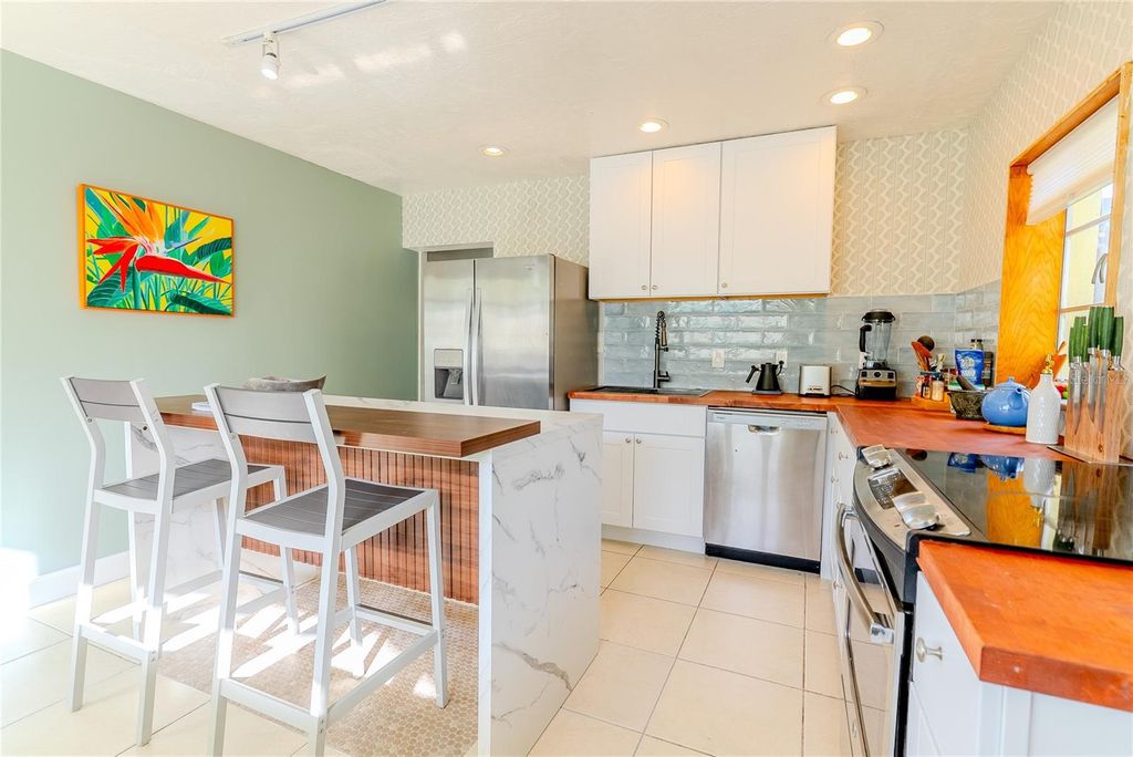 Photo of 412 20th Avenue, Indian Rocks Beach, FL 33785 (MLS # TB8483647)