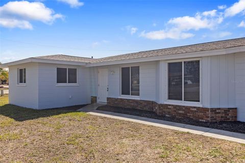 Photo of 441 Greenwich Avenue NW, Port Charlotte, FL 33952 (MLS # C7522690)