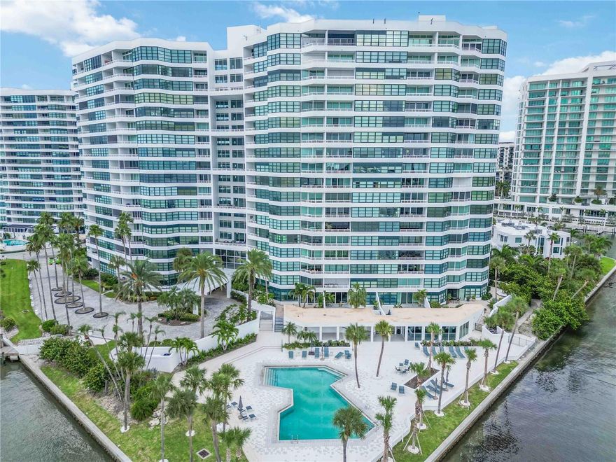 LOCATION LOCATION LOCATION AND VIEWS GALORE! This rarely available 3 bedroom, 3 bath penthouse floorplan provides you fabulous views from the 17th floor end unit. Mesmerizing endless vistas of Siesta, Lido and Longboat Keys along with the parade of boats on Sarasota Bay, the Intercoastal Waterway and the lights of downtown Sarasota and the Ringling Bridge bring you both tranquility and activity/proximity to everything Sarasota has to offer. The spacious great room plan has travertine flooring throughout the main living area and an updated kitchen that the chef will love - tons of storage space with Corian countertops, a center island and built in wood cabinets. The kitchen has a desk area, a breakfast bar which opens to the living and dining areas and magnificent water views. The en suite primary bed/bath is incredibly spacious with customized walk in closets, double vanities in the bath, a roomy walk in shower and a relaxing porch area with sliders to overlook the bay. Powder room and guest baths have been updated. You won't want to leave but you must take advantage of the beautiful, updated heated pool right on the bay and Condo on the Bay's own private marina where you can keep your boat or have guests use the day dock when visiting. You'll have peace of mind with a guarded gate house, full time concierge and manager on premises. Grab a book from the condo library, cater a large party in the community lounge with full kitchen or get some exercise in the fitness room or on the tennis and pickleball courts. Walking distance to entertainment at the Van Wezel (currently under construction), multiple downtown theatre venues, restaurants, and the vibrant arts community Sarasota is known for. You may have to be convinced to leave - but you will surely want to take a quick drive over to Lido or world famous Siesta Key beaches. Whatever your pleasure - rest assured your views will always be your views as you are right on Sarasota Bay with not a crane in sight!!! You will have it all at Condo on the Bay!