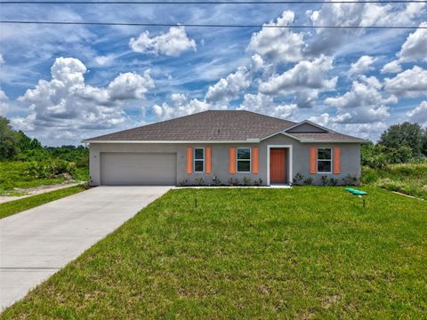 Photo of 170 Patio Street, Lehigh Acres, FL 33974 (MLS # O6333182)