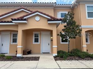 Beautiful 2 bedroom 2.5 bath townhome located in the highly sought after Regal Oaks community. This property is nestled close to Old town and Fun Spot, 10 minute drive to Disney. Open floor plan, home is fully furnished. The kitchen comes equipped with stainless appliances and granite countertops. This home also features a screened in lanai with an above ground spa for your personal relaxation and enjoyment. Enjoy Resort Style community pool and water park also featuring a restaurant, lounge, pool bar & grill, Fitness center, convenience store, all set inside a gated community.