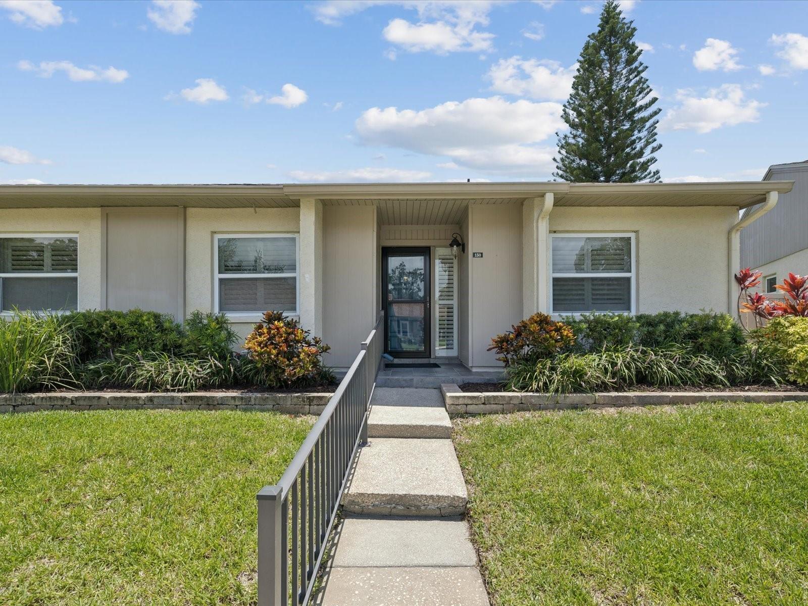 Welcome to this stunning, fully renovated 4 bedroom, 2 bathroom East Lake Woodlands villa. Located on Hole #15 of the East Lake Woodlands South course in this highly sought-after gated golf community. Step inside to find a bright, open layout featuring tile flooring throughout, custom shutters, and stylish finishes. The open kitchen boasts elegant marble countertops, crisp white cabinets, stainless steel appliances, and beautiful fixtures. Enjoy relaxing evenings by the LED fireplace, or entertain in the spacious 21’ x 7’ Florida room, which opens to a paver patio with sweeping golf course views. The versatile floor plan includes a private patio off the 4th bedroom, perfect for a home office or guest suite. Additional features include new windows, French doors, new paint throughout, attic storage, water softener, inside utility with full washer/dryer and a carport just steps from your front door for ultimate convenience. Residents can opt to join the prestigious Ardea Country Club, offering a variety of membership options that include golf, tennis, pickleball, swimming, fitness and social events. Don’t miss this opportunity to own a turnkey villa in one of Tampa Bay’s premier golf communities. Experience this model perfect villa for the perfect location, and lifestyle, schedule your private showing today!
