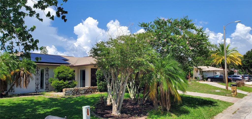 Photo of 7438 Lake Forest Circle, Port Richey, FL 34668 (MLS # TB8408149)