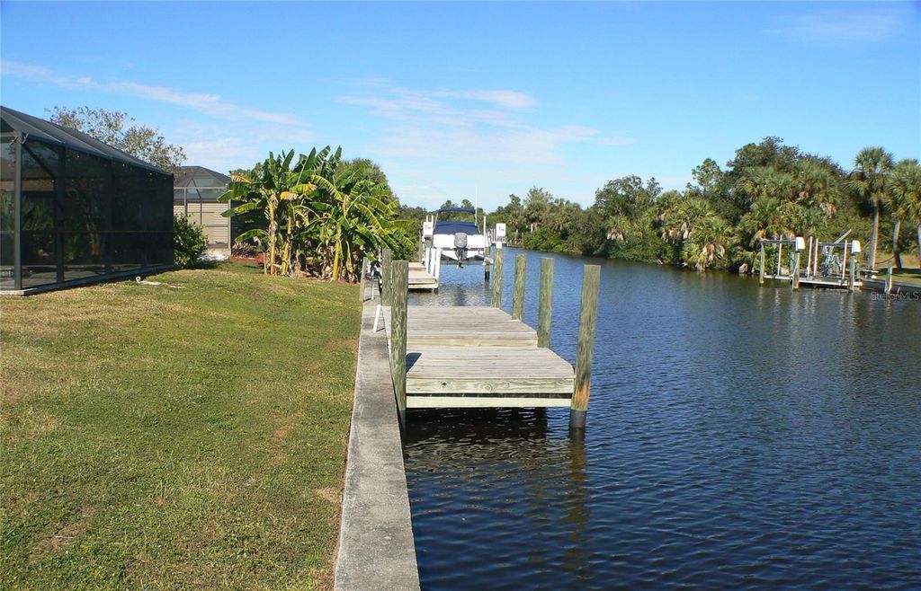 Photo of 3472 Como Street, Port Charlotte, FL 33948 (MLS # C7517115)