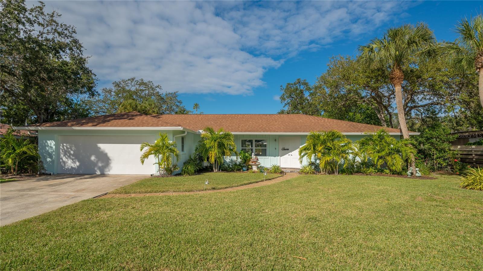 This home has a split plan, generous size bedrooms and walk-in closets with a coastal theme flare. Open floor concept with formal dining. The kitchen as the heart of the home is expertly appointed with everything you will need for your home cooked meals. Head outside to the brand new beautiful pool and spa. One end features a soaking or sunbathing area, then step into the crystal clear deep end. Plenty of new stone pool deck on the offered lounge chairs to bask in the Florida sun.
Welcome to peaceful Buttonwood Harbour, composed of 50 homes in one of Longboat Key's oldest and sought-after communities. Situated in the middle of Longboat Key, it is walking distance for most, to Publix, the Shoppes of Bay Isles, Tennis, post office, and CVS. Full of friendly neighbors and a favorite place for nature lovers. Boaters and fisherman will be happy with accessibility to the BHA boat ramp for launching and ability to dock your boat at the house during your stay, even utilize the kayak storage if you decide to rent them. No bridges from Buttonwood Harbour out to Sarasota Bay's open waters. Enjoy the day at Bayfront Park, 1.4 miles from the house. Amenities found at Bayfront Park include a 1,350 square foot indoor Recreation Center, a playground, a basketball court, shuffleboard courts, a multi-purpose open field, 3 dedicated pickleball courts, a tennis court, picnic tables, restrooms, and parking for a Town public beach access located across the street. The Bayfront Park Recreation Center is a public recreation facility run by the Town of Longboat Key. You will also find a dog park for your fur babies.