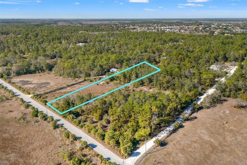 Photo of Long Lake Avenue, Weeki Wachee, FL 34613 (MLS # TB8467437)