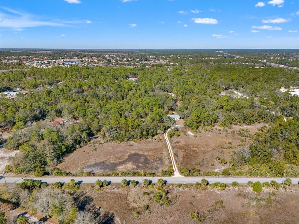 Photo of Long Lake Avenue, Weeki Wachee, FL 34613 (MLS # TB8467437)