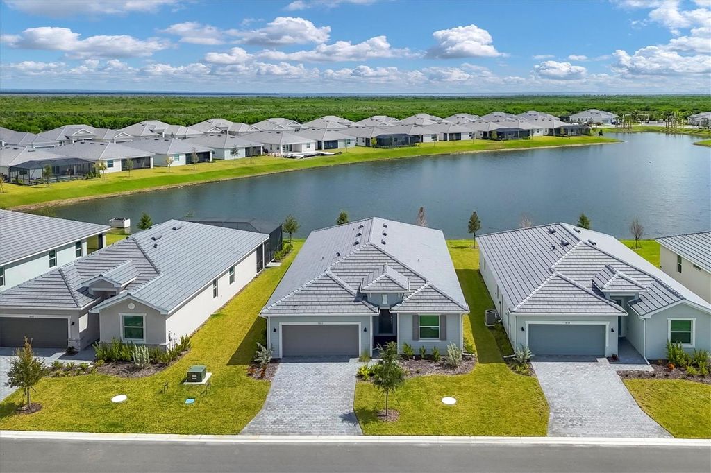 Photo of 7863 Lakes Edge Lane, Port Charlotte, FL 33981 (MLS # D6144052)