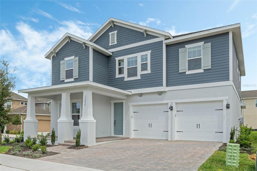 Under Construction. Luxury New Home by RockWell Homes, selling from offsite sales center: 14006 Scarlet Aster Alley Winter Garden, FL 34787. The Faulkner Plan on Homesite #267. Experience the ultimate in modern luxury with this stunning new home. This spacious 5 bedroom, 4-bathroom design offers the perfect combination of style, functionality, and comfort. The home features a 3-car garage, a covered front porch and a covered backyard lanai, ideal for outdoor relaxation or entertaining.  The heart of the home is the chef-inspired kitchen, which includes solid surface countertops, an island, and high-end stainless steel gas appliances, such as a cooktop, oven, microwave, and dishwasher. The kitchen also features an undermount sink with a Delta faucet, a beautiful ceramic tile backsplash, upgraded 42-inch cabinets, Delta faucet and a huge walk-in pantry, providing ample storage and making it a dream space for any home chef.  The spacious living area is designed with upgraded flooring and enhanced with natural light flowing in through dual-pane energy-efficient windows. These windows offer access to the covered backyard patio, seamlessly blending indoor and outdoor living spaces.  The private primary suite is a true retreat, featuring dual sink vanities with Delta faucets, ceramic tile flooring, and a luxurious oversized shower with a glass enclosure. Additional features include a lighting package, towel bars, and a huge walk-in closet, offering plenty of storage and comfort.  The secondary bedrooms are generously sized, each with its own walk-in closet and access to separate bathrooms. These bathrooms include ceramic tile flooring, ceramic tile tub/shower surrounds, Delta faucets, lighting packages, and towel bars, ensuring both style and functionality.  Additional features of this exceptional new home include a full sprinkler system, a complete landscaping package, energy-efficient construction, a garage door opener, and a utility area with ceramic tile flooring. The home also boasts an 8-foot front door, a private backyard for added privacy, and a new home warranty for peace of mind.  This luxury new home by RockWell Homes offers a perfect combination of upscale living, energy efficiency, and a beautifully designed layout. It’s ideal for those looking for both style and comfort in their next home.