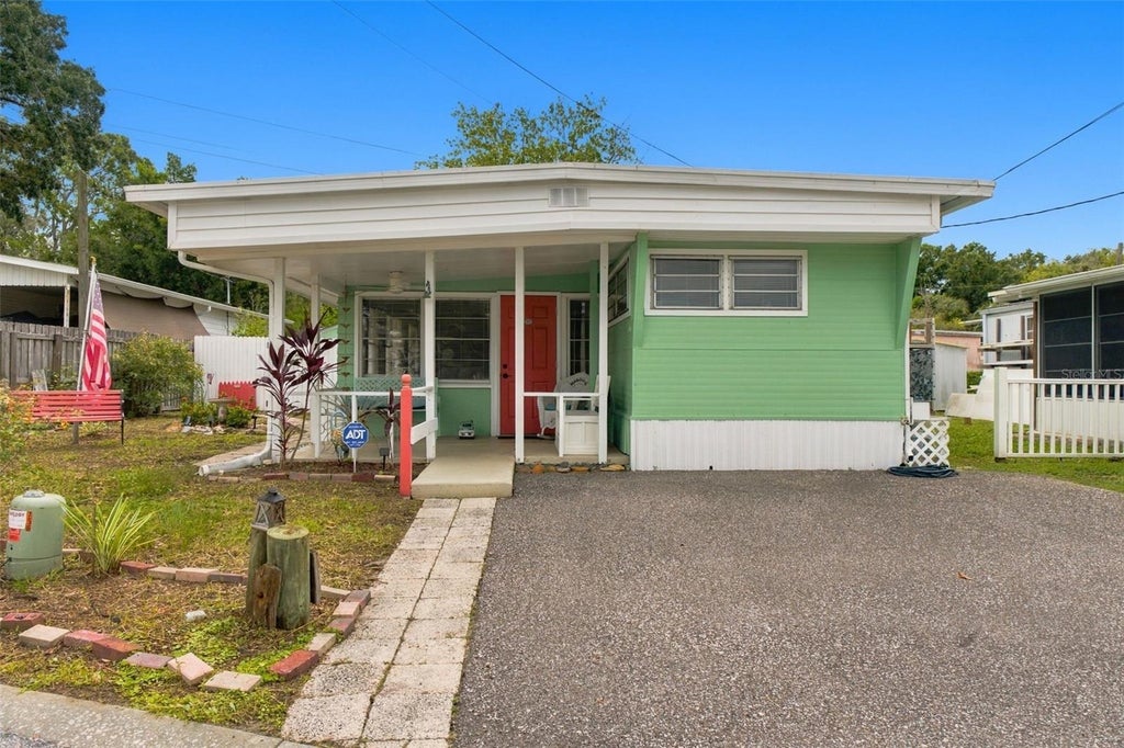 Photo of 752 Driftwood Lane, Tarpon Springs, FL 34689 (MLS # W7890109)
