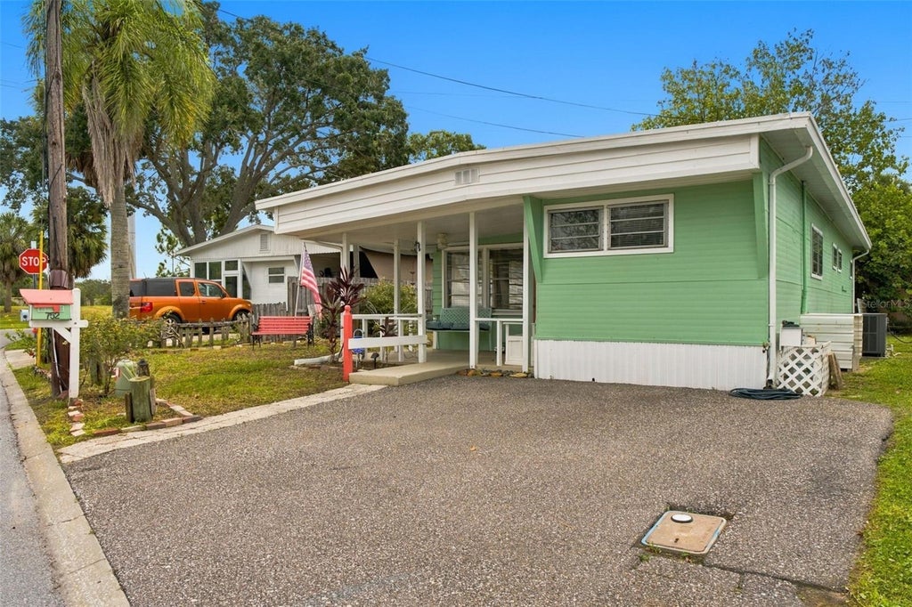 Photo of 752 Driftwood Lane, Tarpon Springs, FL 34689 (MLS # W7890109)