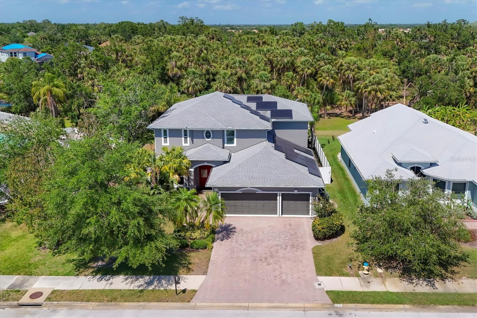Annual furnished rental available immediately! Beautifully furnished five-bedroom, four-bath with office. This exquisite home in the Riomar community has a huge screened-in saltwater pool and spa with ultimate privacy backing up to a wooded preserve. The home is loaded with technology including the Alert 360 Alarm System/cameras, Google Pro Mesh Network, and Tesla Powerwall with two battery packs. The three-car garage provides ample space in addition to an abundance of closet space in each of the five bedrooms, all featuring built-in shelving. The chef’s kitchen will not disappoint with Google Lights, Bosch dishwasher, LG convection oven and KitchenAid refrigerator. Don’t miss out on this one!