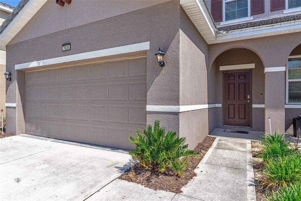 Photo of 7635 Oakmoss Loop, Davenport, FL 33837 (MLS # O6401854)