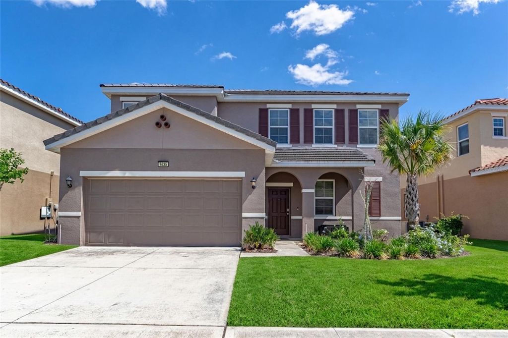 Photo of 7635 Oakmoss Loop, Davenport, FL 33837 (MLS # O6401854)