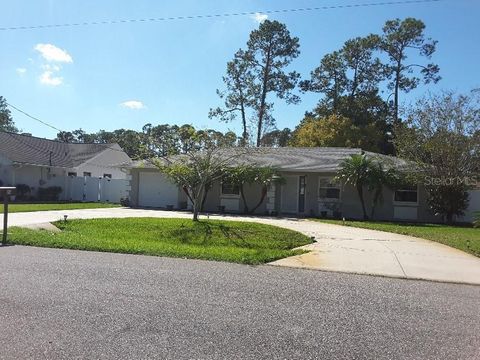 Photo of 74 Berkshire Lane, Palm Coast, FL 32137 (MLS # O6356902)