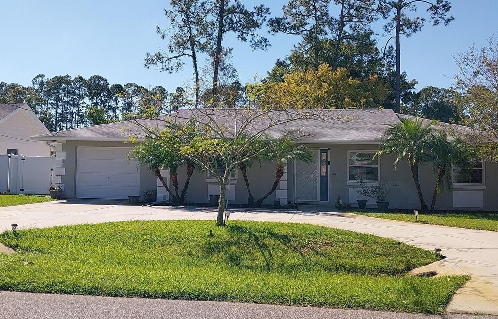 Photo of 74 Berkshire Lane, Palm Coast, FL 32137 (MLS # O6356902)