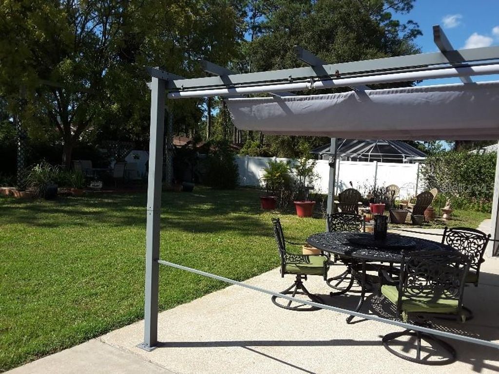 Photo of 74 Berkshire Lane, Palm Coast, FL 32137 (MLS # O6356902)