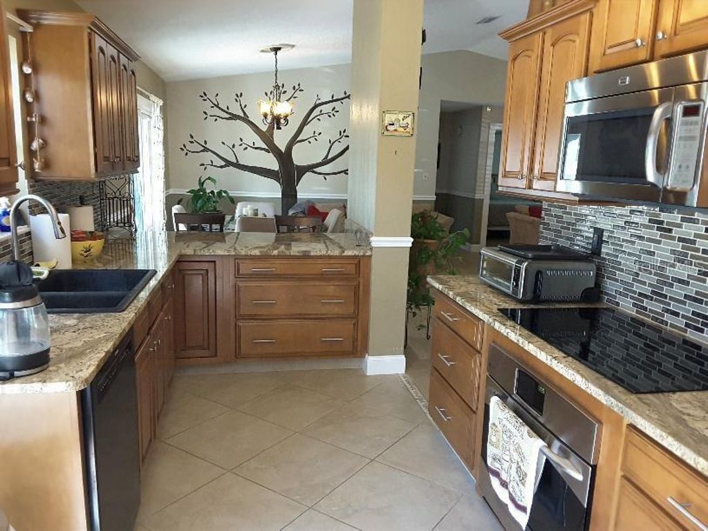 Photo of 74 Berkshire Lane, Palm Coast, FL 32137 (MLS # O6356902)