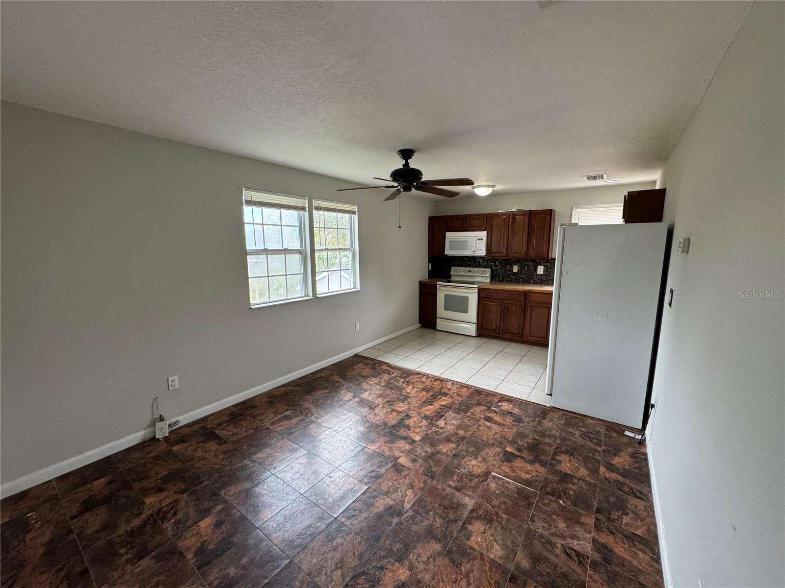 Welcome to 9407 Riverview Dr, a charming 1 bedroom, 1 bathroom home in the heart of Riverview, FL, offering 650 sq. ft. of spacious living on a generous 0.41-acre lot. Built in 2003, features a bright and airy layout with ceramic tile, modern kitchen boasts wood cabinets, new countertops, and all appliances, seamlessly connecting to a formal dining room and a cozy family room, perfect for entertaining. Nestled in a car-dependent Southeast Tampa neighborhood near Hillsborough Bay, this home provides easy access to I-75, shopping, dining, and recreational amenities like Apollo Beach and Williams Park boat ramp, just 2 miles away.