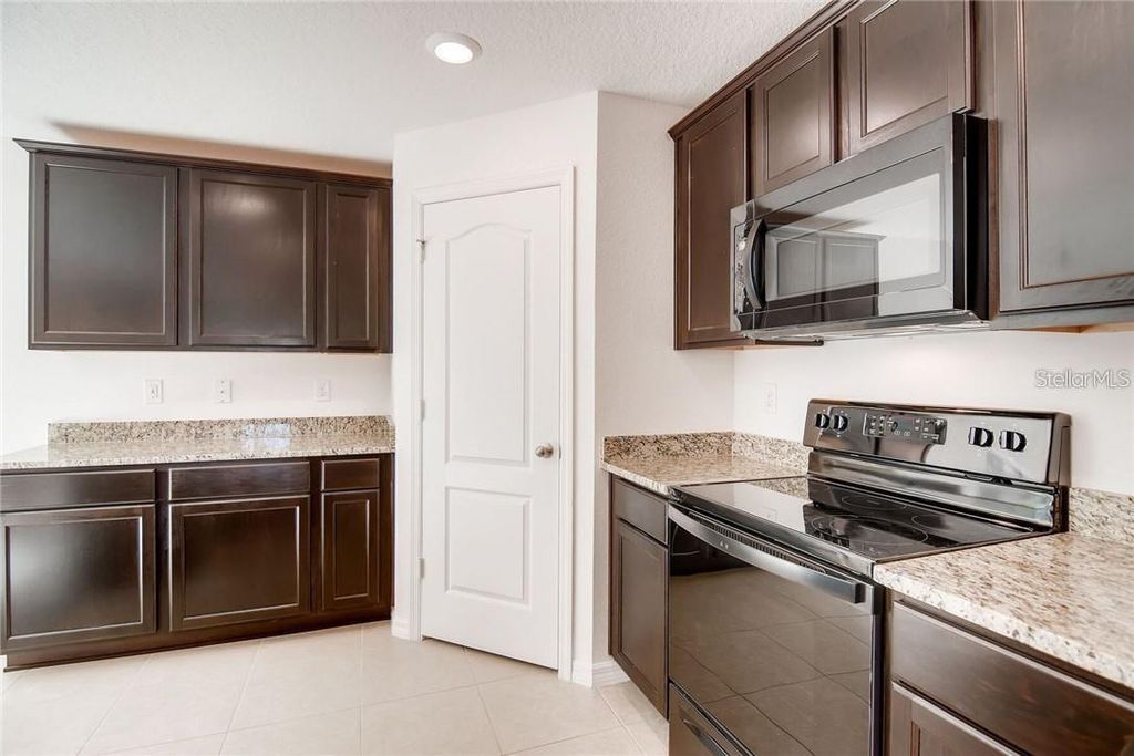 Photo of 1597 Orne Street, Mascotte, FL 34753 (MLS # V4948614)