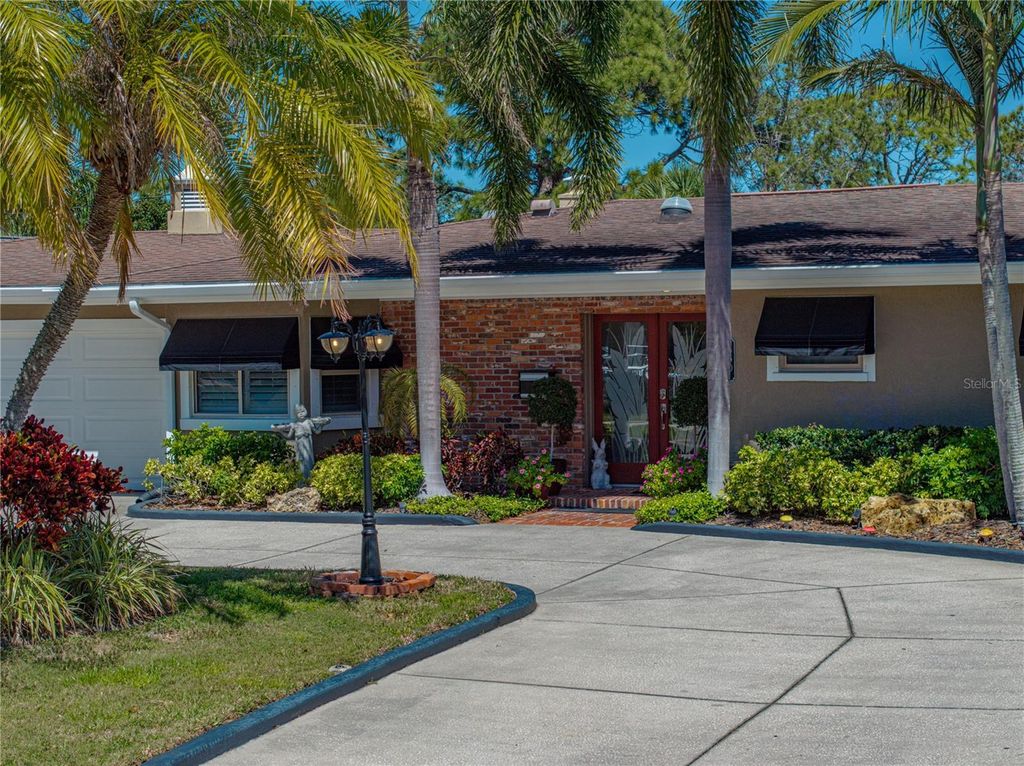 Photo of 650 Poinsettia Road, Belleair, FL 33756 (MLS # O6359946)
