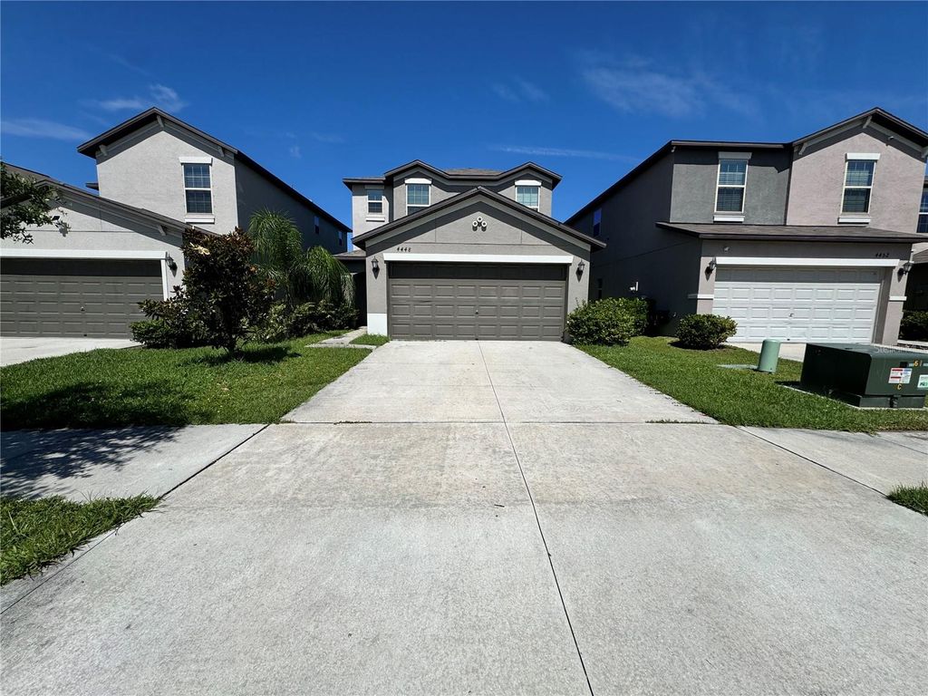 Photo of 4448 Globe Thistle Dr, Tampa, FL 33619 (MLS # TB8395453)