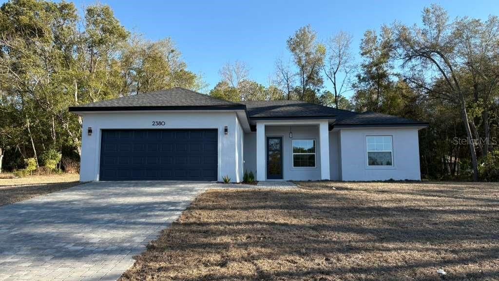 Photo of 2380 W Gardenia Drive, Citrus Springs, FL 34434 (MLS # O6385116)
