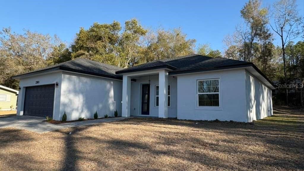 Photo of 2380 W Gardenia Drive, Citrus Springs, FL 34434 (MLS # O6385116)