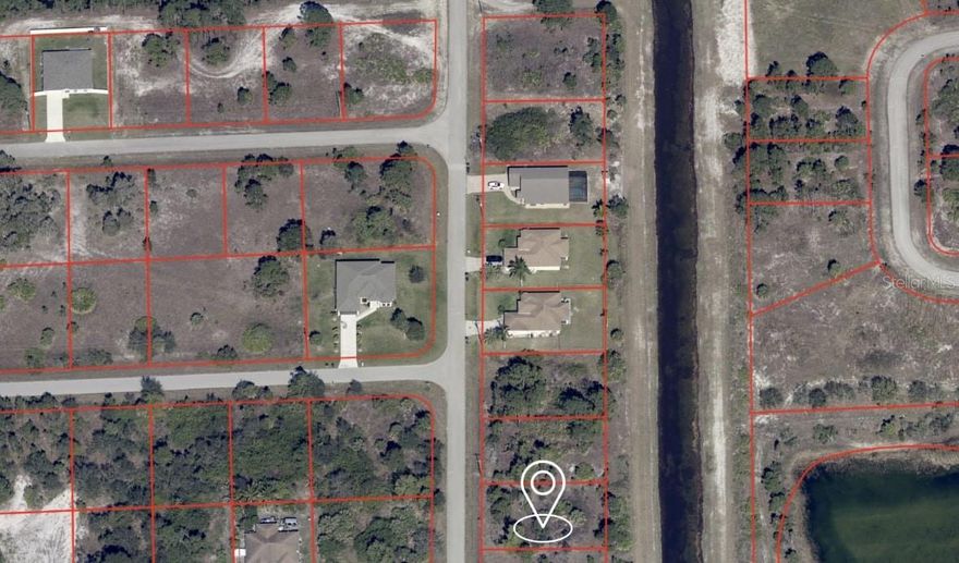 Fantastic canal front lot in a great location! This vacant lot has a canal in the back yard giving you extra privacy for your new home. No HOA, not in a flooding zone and no deed restrictions! Located just north of State Road 82 this location gives you quick access in and out of the neighborhood, but you're still just minutes to shopping, dining, schools and entertainment. Buy now and build or hold this parcel for future development. The taxes are low and there aren't any timeframes for building. Great as investment and/or for your new home!