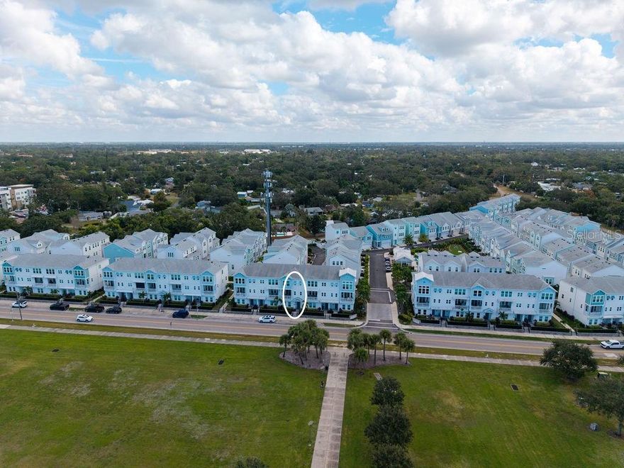 Experience luxury, location, and lifestyle in this turnkey-FURNISHED townhome in Sarasota’s sought-after Payne Park Village. Overlooking the scenic 29-acre Payne Park, this three-story residence offers breathtaking views of the park and Downtown Sarasota’s skyline from every level and stunning sunsets to end each day. Thoughtfully designed for comfort and convenience, the home features a PRIVATE ELEVATOR, three spacious bedrooms each with ensuite baths, three and a half bathrooms, and a two-car garage. Inside, the open-concept living area is bright and welcoming, centered around a chef’s kitchen with a large quartz-topped island, 42" cabinetry, and plenty of room for entertaining. The luxurious primary suite is a true retreat, showcasing floor-to-ceiling windows with panoramic park views, a coffee bar, a generous walk-in closet, and a spa-inspired bathroom complete with soaking tub, oversized shower, and dual sinks. High-quality construction elements, including hurricane-impact windows, ensure both style and peace of mind. Step outside and enjoy an unmatched lifestyle. Payne Park’s lush greenbelt areas and paved, tree-lined paths are perfect for walking, jogging, or biking. Residents have access to the community’s private amenity center with a heated pool and spa, plus direct access to Sarasota’s Legacy Trail, which conveniently connects downtown all the way to Venice. Just outside your doorstep, Payne Park offers tennis courts, a disc golf course, a skate park, a serene pond, and the beloved Circus Park playground.  Don’t miss this rare opportunity to live in a beautiful turnkey home surrounded by the best of downtown Sarasota’s vibrant, walkable lifestyle.