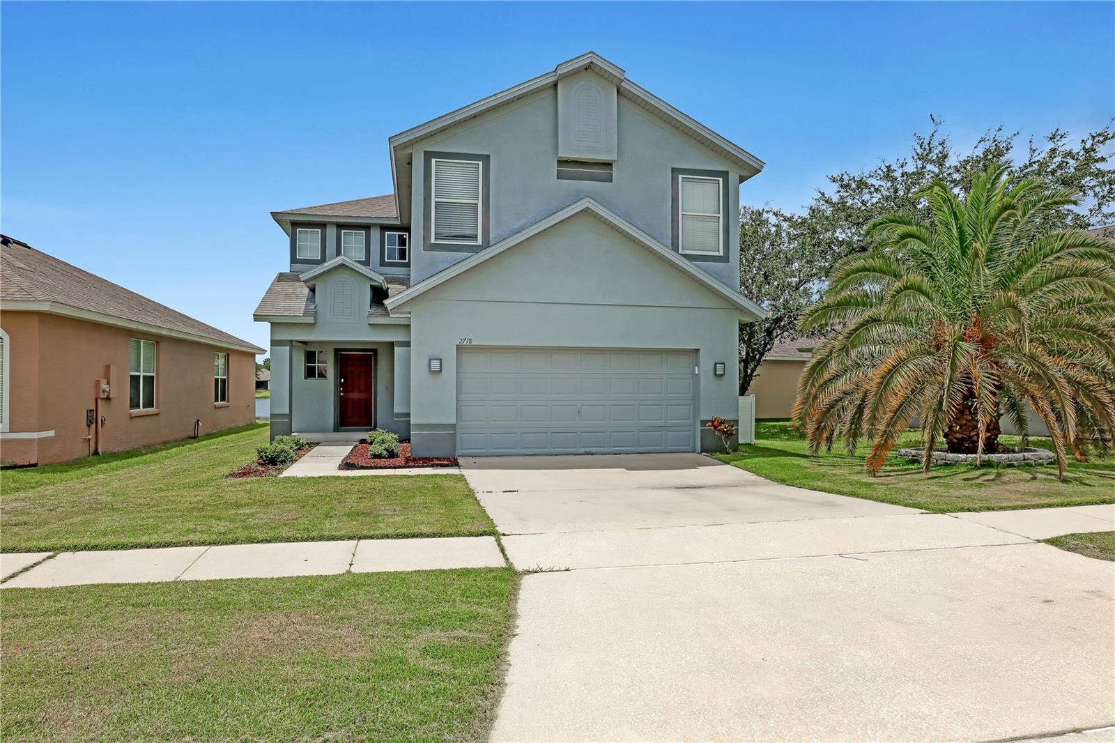 Introducing Cypress Bend in 32825! Nestled in a secure GATED community, this hidden gem boasts 4 Bedrooms, 2.5 Bathrooms, and a captivating POND VIEW. Notable features include a newer roof (2016), **BRAND NEW AC UNIT JUST INSTALLED ** A tankless water heater was installed just 7 months ago, fresh exterior paint (2021), and an UPDATED KITCHEN with a stone accent wall, and stainless-steel appliances. The open-concept living room with tile flooring, welcomes an abundance of NATURAL LIGHT through sliding glass doors. Upstairs, the WOOD PLANK flooring leads you to the generous PRIMARY SUITE with a tray ceiling, walk-in closet, and a spa-like EN-SUITE BATH featuring dual sinks, a soaking tub, and a separate shower. Two additional bedrooms upstairs have been combined to create a LARGE THEATER ROOM (equipment conveys!) - however seller can easily convert it back into bedrooms if buyer would prefer that! Entertainment options abound with a spacious 32x25 PATIO overlooking the serene POND. The community of Cypress Bend offers a COMMUNITY POOL and playground, creating a welcoming environment for its residents. Located near major highways, including the Central Florida Greenway (417), East-West Expressway (408), and E. Colonial Dr. (Highway 50), are within close proximity. Universities and colleges such as Valencia College, University of Central Florida (UCF), and Full Sail University are easily accessible. Additionally, a variety of supermarkets, restaurants, and other conveniences are just a short distance away. The house is equipped with modern features to enhance your living experience, including a WIFI thermostat for effortless climate control and an irrigation system to keep the yard looking its best. With its impeccable updates, serene pond view, and convenient location, this home is truly a rare find. Don't miss the opportunity to make it yours. Contact us today to schedule a viewing and experience the lifestyle this remarkable property offers.