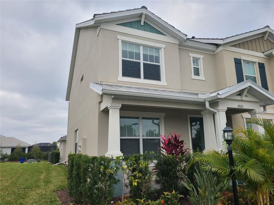 END UNIT Townhouse. GATED COMMUNITY. 2-bedroom 2.5 bath with detached 2 car garage. Paved driveway gives you additional parking spaces. This unit has 2 bedrooms upstairs each has an attached bathroom. This is like having 2 separate suites each with your own walk-in closet and a bathroom. Kitchen has nice upgrades. Granite counters and stainless appliances. There is a laundry room with a washer and dryer that stays. Walk in Pantry by the kitchen. Main level has waterproof vinyl flooring. High ceiling and lots of natural light. There is a paver courtyard that separates the townhouse and the garage that can used for outdoor gatherings and BBQ's. Town house is directly across resort style pool, pickle ball, basketball, fitness center, spa, playground and clubhouse. Top Notch Schools next door. Lakewood Ranch is a master planned community that has its own Main Street, Restaurants, Theater, Schools, hospitals, and medical offices. Check out www.lakewoodranch.com for more information. Short distance to new UTC Mall, Sarasota Bradenton airport, St Pete, Tampa and area beaches. Rent includes use of amenities. Pet okay with owner approval and non-refundable pet fee. Move in ready.