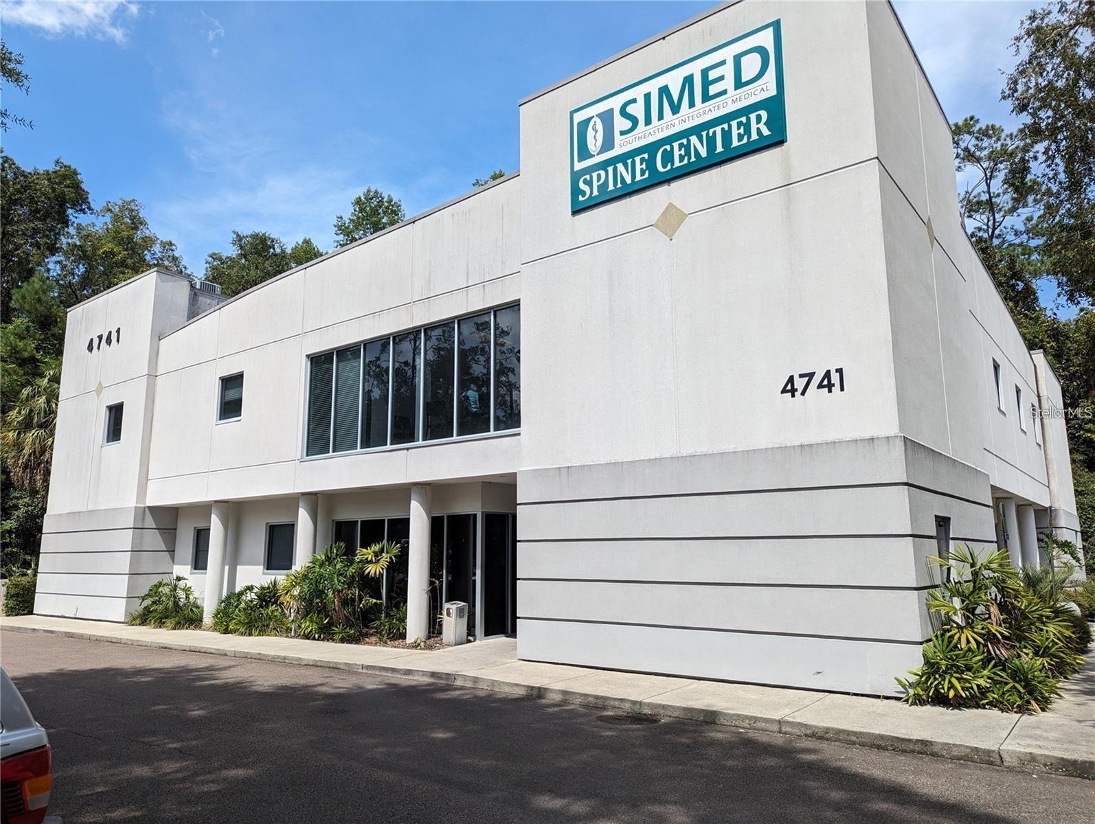 Medical office space with 4626 sq. ft. available in an prime central Gainesville location near Gainesville Health & Fitness and just 1 mile from North Florida Medical Center. Space includes 12 exam rooms w/ sinks and additional 6 rooms w/o sinks that could be used for more exam rooms or offices. There are 4 bathrooms, 2 reception areas and 1 kitchen. Office sits on a nice wooded lot with a great nature view.