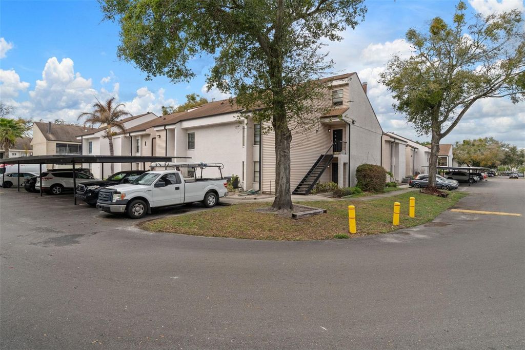 Photo of 4821 Puritan Circle #104, Tampa, FL 33617 (MLS # TB8449149)