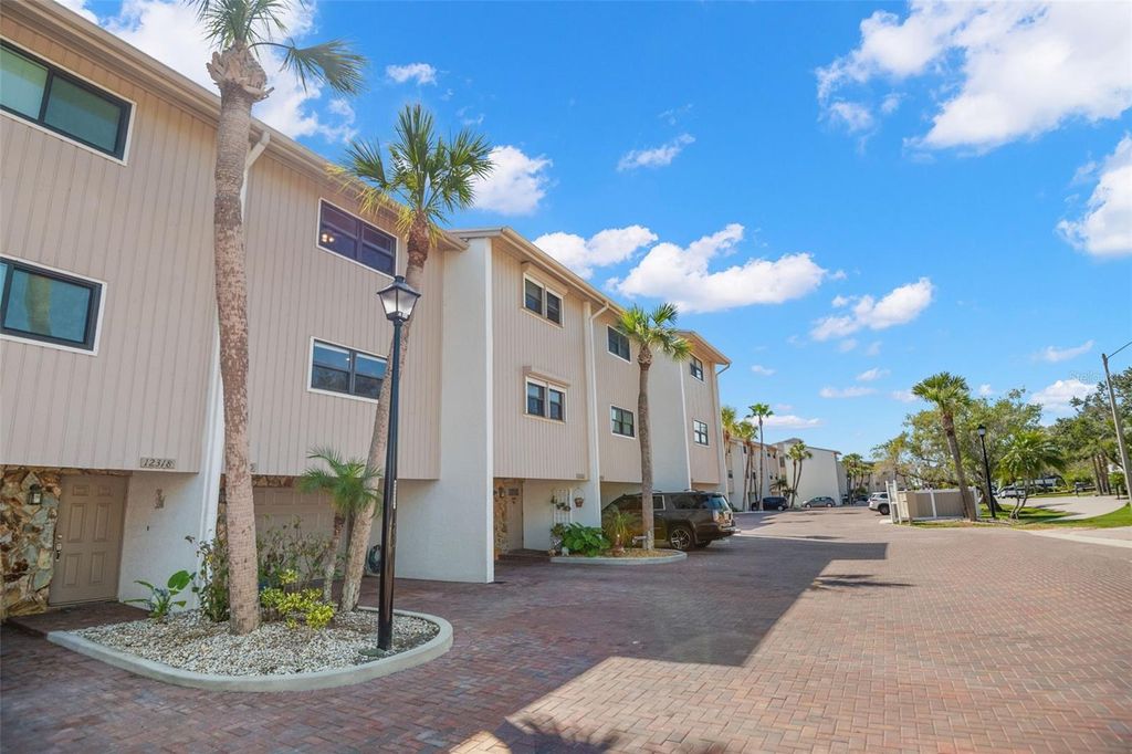 Photo of 12320 Capri Circle N #404, Treasure Island, FL 33706 (MLS # TB8480086)