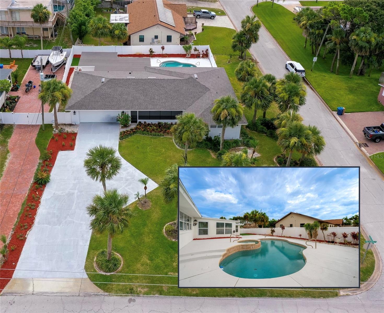 One or more photo(s) has been virtually staged. Coastal Luxury Redefined - Remodeled Pool Home on Coveted John Anderson Drive. Live the coastal lifestyle you've been dreaming of in this stunningly remodeled 4-bedroom, 3-bathroom pool home, ideally situated on prestigious John Anderson Drive. Nestled on a generous corner lot, this immaculate residence offers 2,768 square feet of beautifully updated living space, just steps from the Intracoastal Waterway and only minutes to the no-drive beaches of Ormond Beach. Situated on an oversized corner lot with fresh, updated landscaping and a brand-new roof. AC 2023, Water heater 2025. As you approach, the spacious screened front porch welcomes you with the perfect spot to enjoy your morning coffee as the sun sets over the river. Inside, you'll find an expansive open-concept layout enhanced by a split floor plan that's perfect for multi-generational living or guests. New luxury vinyl plank flooring flows seamlessly throughout, adding coastal elegance. The remodeled kitchen features crisp white cabinetry, granite countertops, a classic subway tile backsplash, breakfast bar seating and brand-new stainless steel appliances. Just off the kitchen is a spacious separate dining area perfect for hosting, while the huge family room provides an ideal gathering space for family and friends. One of the home's standout features is its dual primary suites, each with private ensuite bathrooms, offering comfort and flexibility. Step outside to your private backyard retreat, where a sparkling inground pool takes center stage. Surrounded by an expansive pool deck, there's plenty of room for lounging, entertaining, and soaking up the Florida sunshine. The fully fenced backyard with vinyl privacy fencing creates a peaceful, secure oasis for kids, pets, or simply unwinding after a day at the beach. Brand new septic tank. This prime location is one of Ormond Beach's most coveted areas, just across the street from the serene Halifax River, perfect for kayaking, paddleboarding, or evening strolls, and only minutes from Ormond's pristine, no-drive beaches, shops, parks, and local dining. Don't miss your chance to own this exceptional coastal retreat on John Anderson Drive. All information recorded in the MLS is intended to be accurate but cannot be guaranteed.