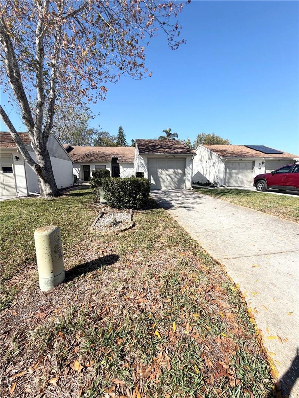 Photo of 11717 Spring Tree Lane, Port Richey, FL 34668 (MLS # TB8482203)