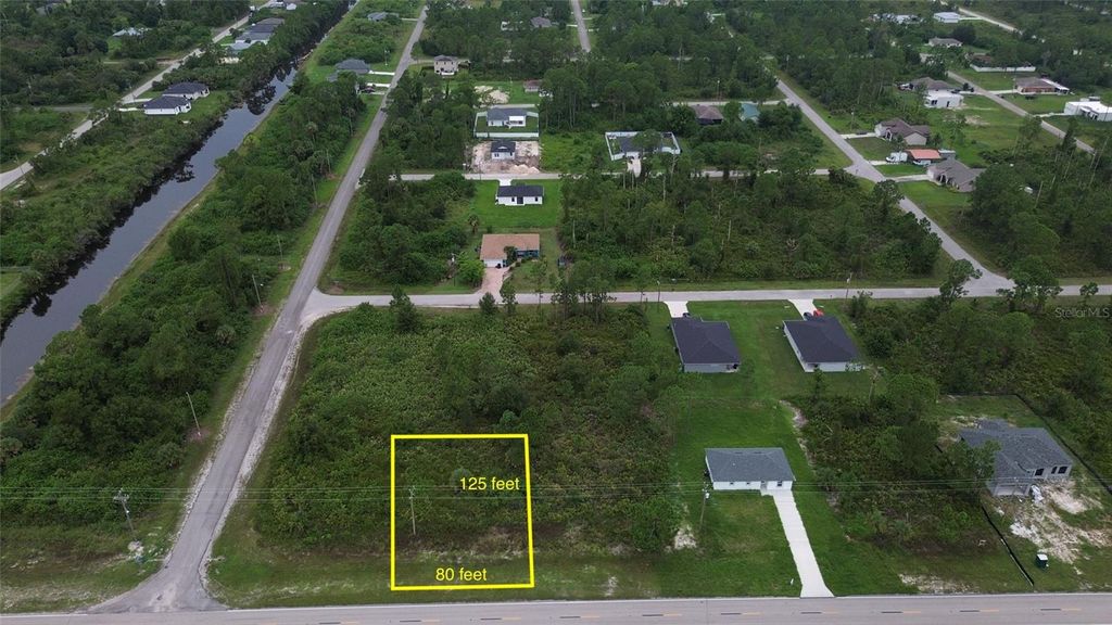 Photo of 464 Columbus Blvd, Lehigh Acres, FL 33974 (MLS # O6342815)