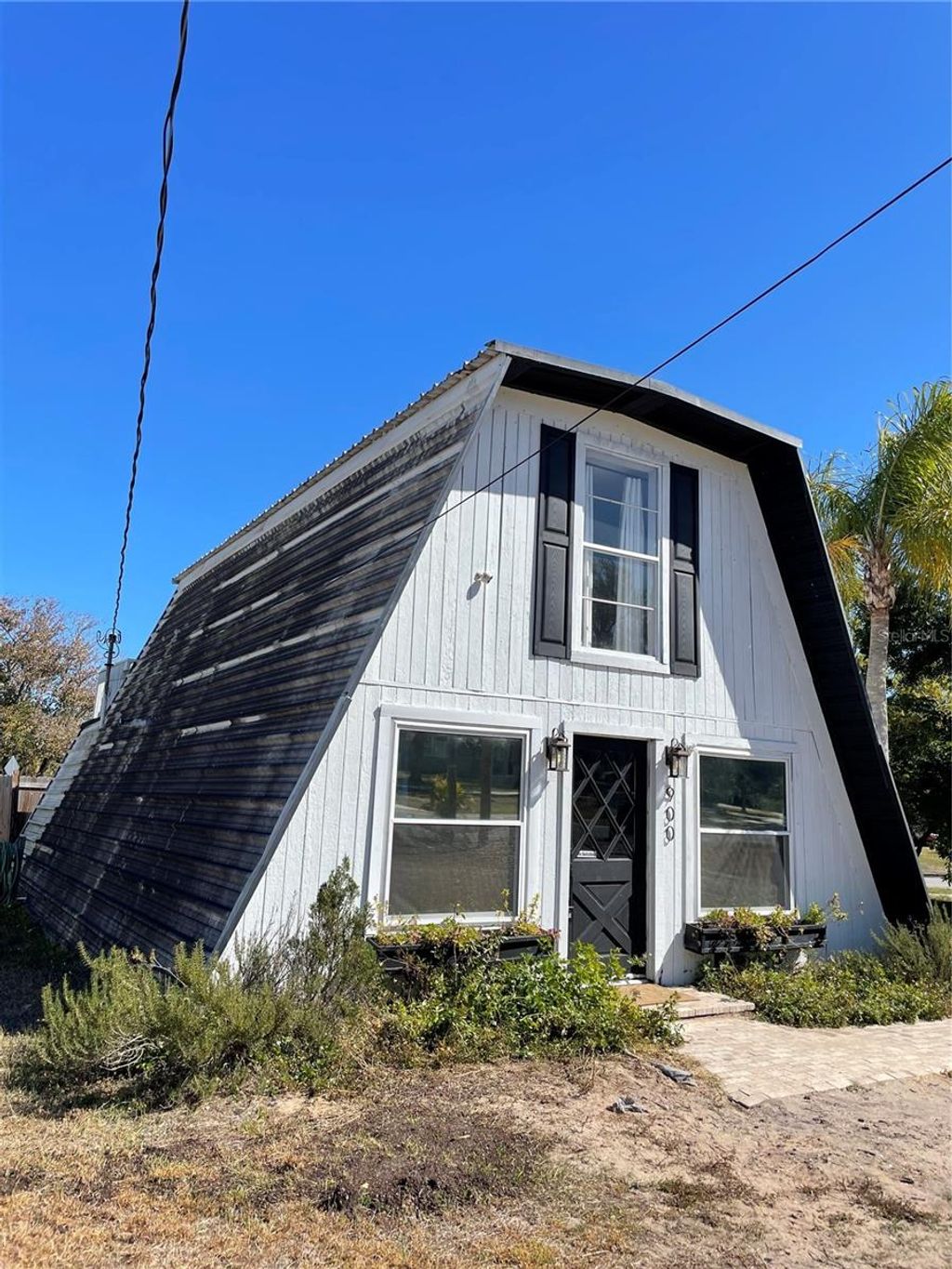 Photo of 900 Riverside Drive, Tarpon Springs, FL 34689 (MLS # A4679911)