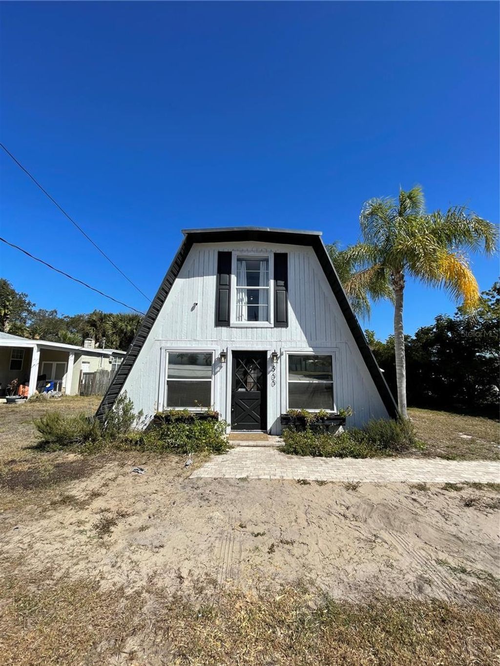 Photo of 900 Riverside Drive, Tarpon Springs, FL 34689 (MLS # A4679911)